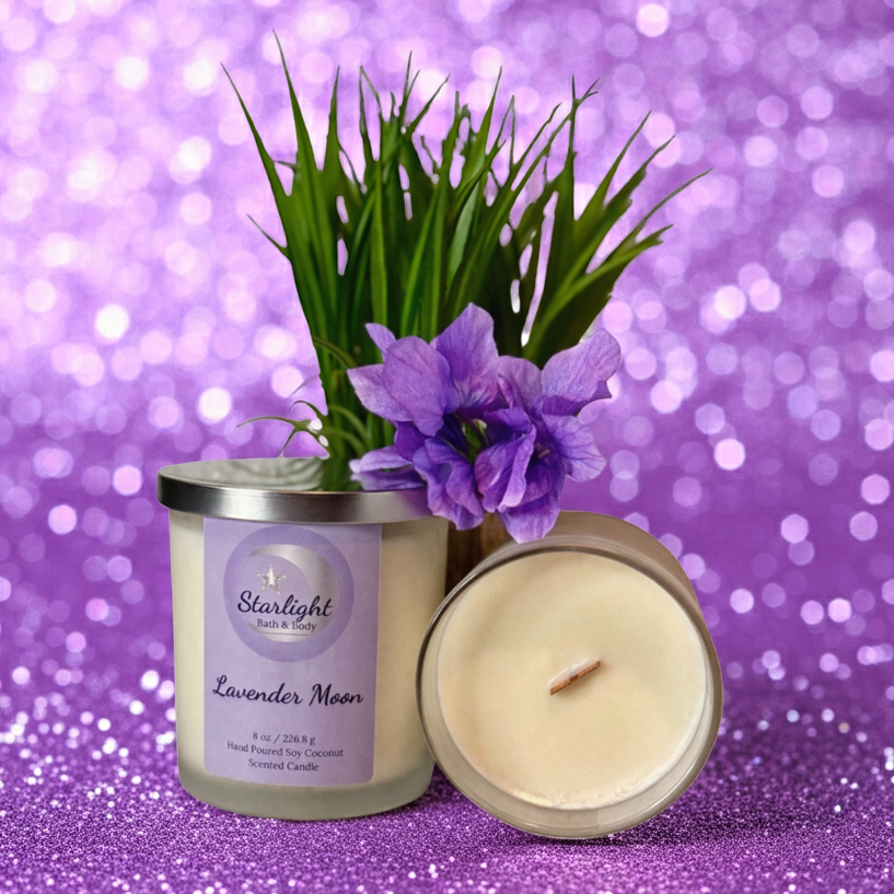 Candle and packaging with lavender flowers on a purple glittery background