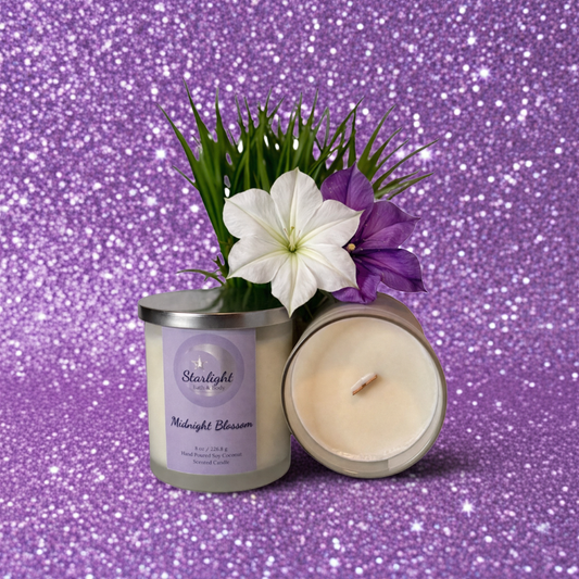 Candle with floral arrangement on a glittery purple background